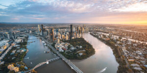 Brisbane City at the river bend at sunset - 2250x1125