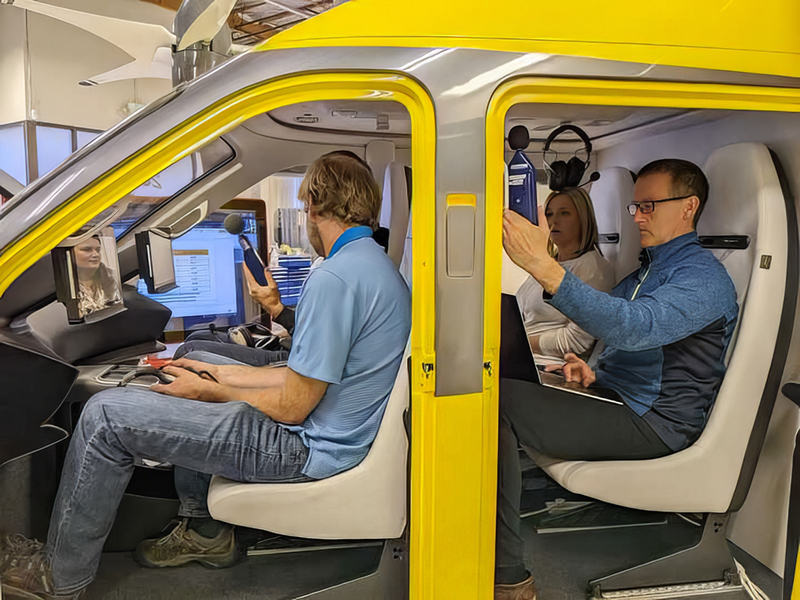 Wisk Employees Seated in our testing cabin. 